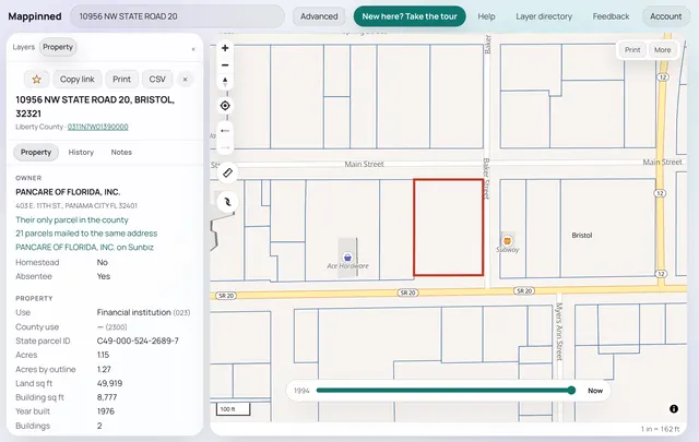 A parcel's report beside the map, its outline in red